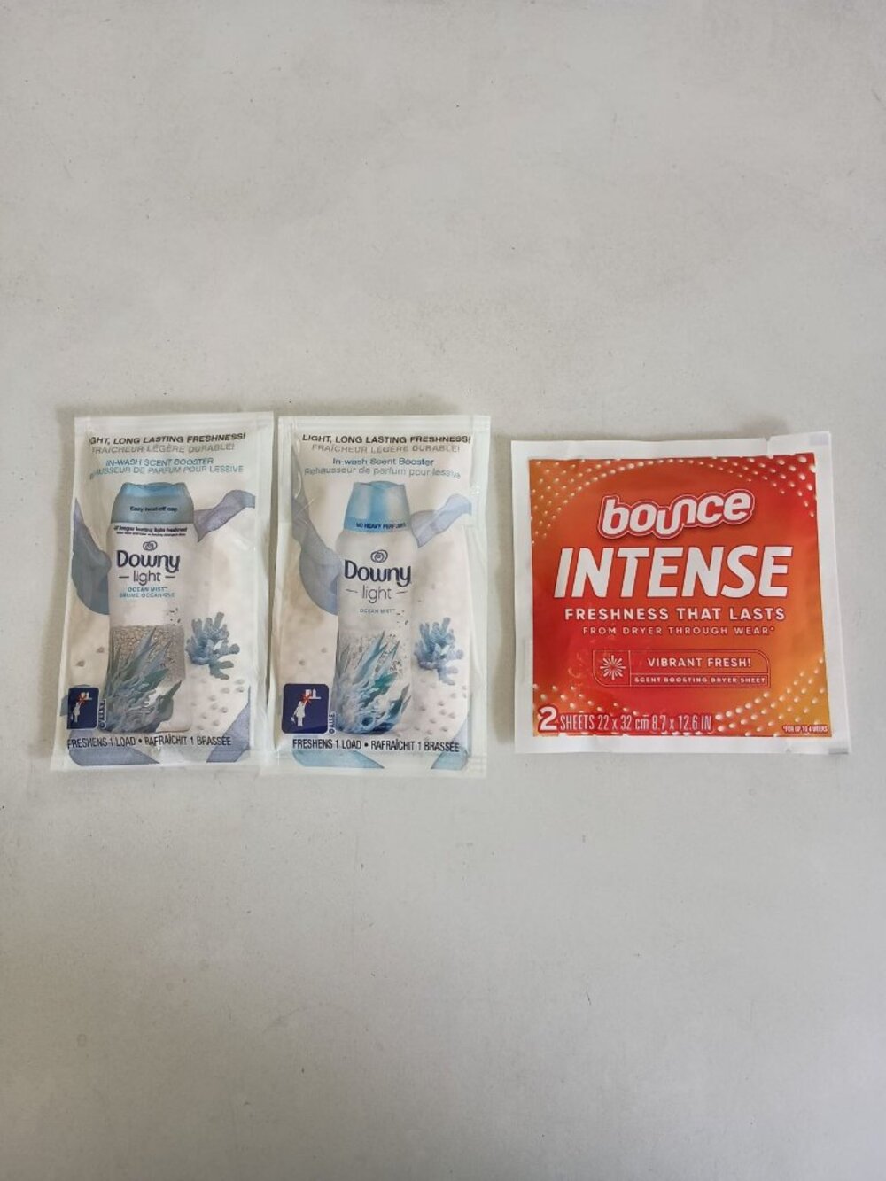 Downy Light scent boosters and Bounce dryer sheets